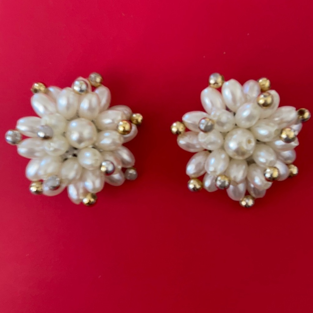 Pearl like cream color earrings with gold accents clip on back  comfortable.